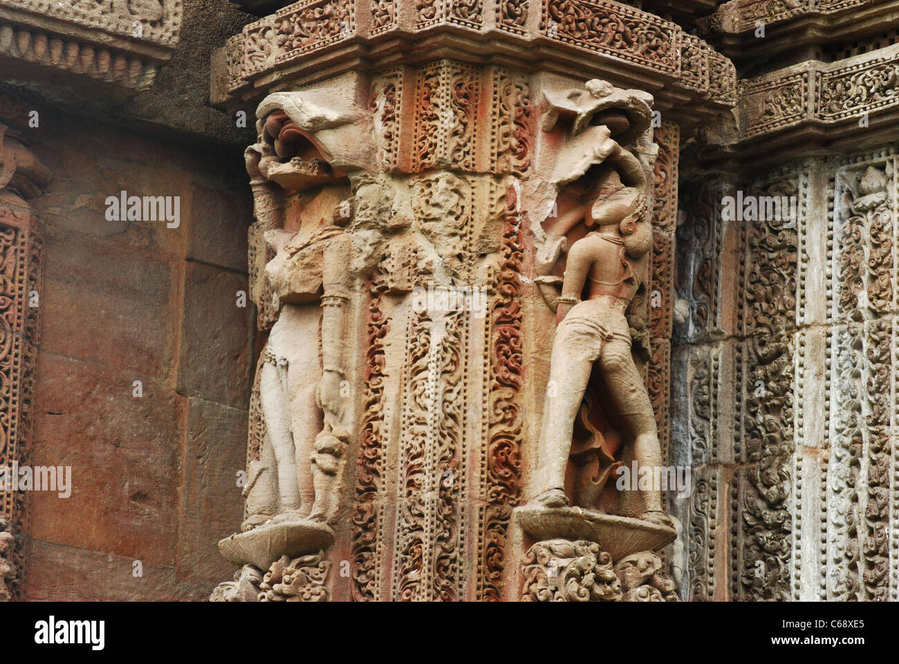 Broken sculptures of women on Raja Rani Temple Stock Photo