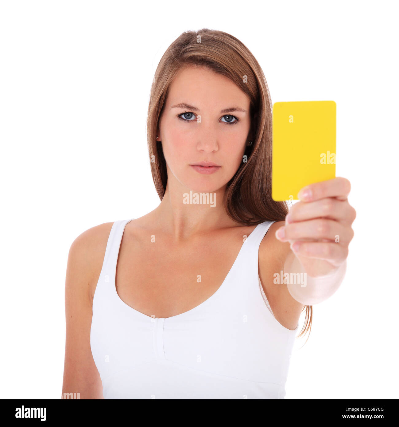 Attractive young woman showing yellow card. All on white background. Stock Photo