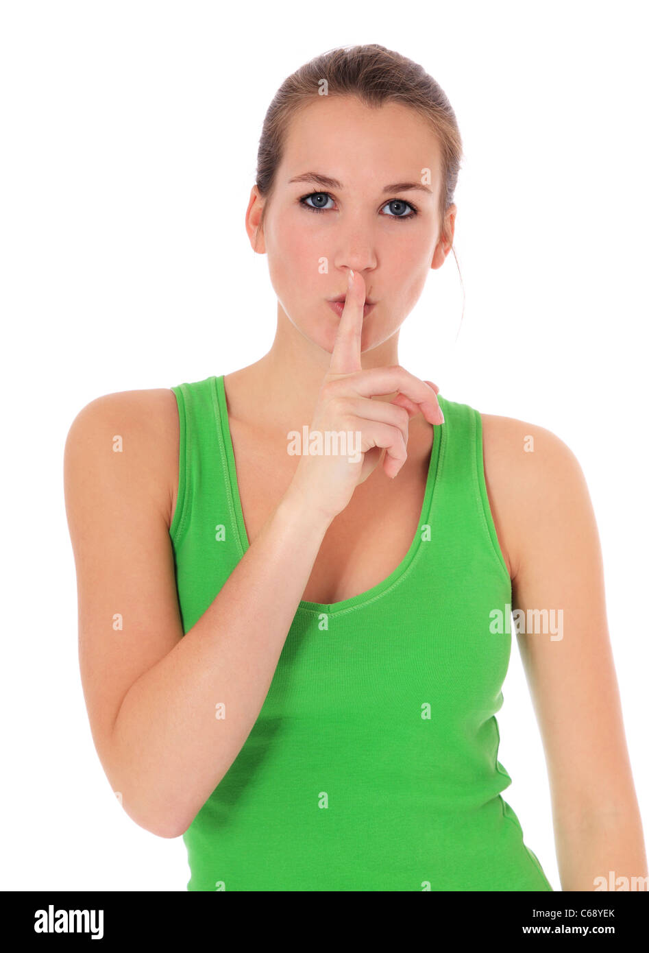 Attractive young woman asks for silence. All on white background. Stock Photo