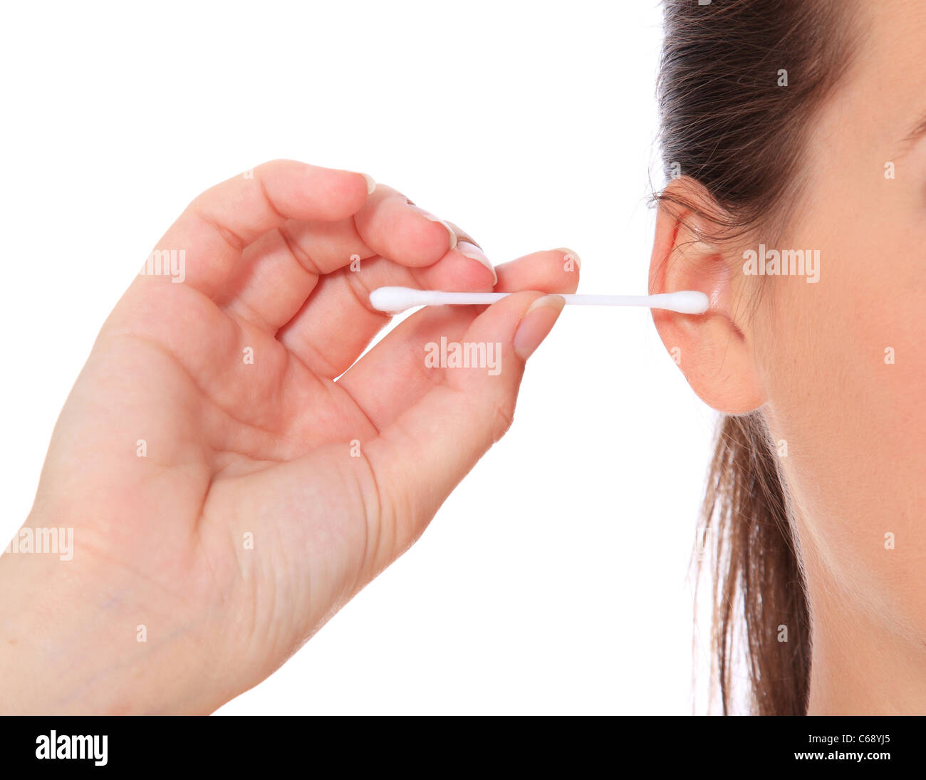 Female person using cotton stick. All on white background. Stock Photo