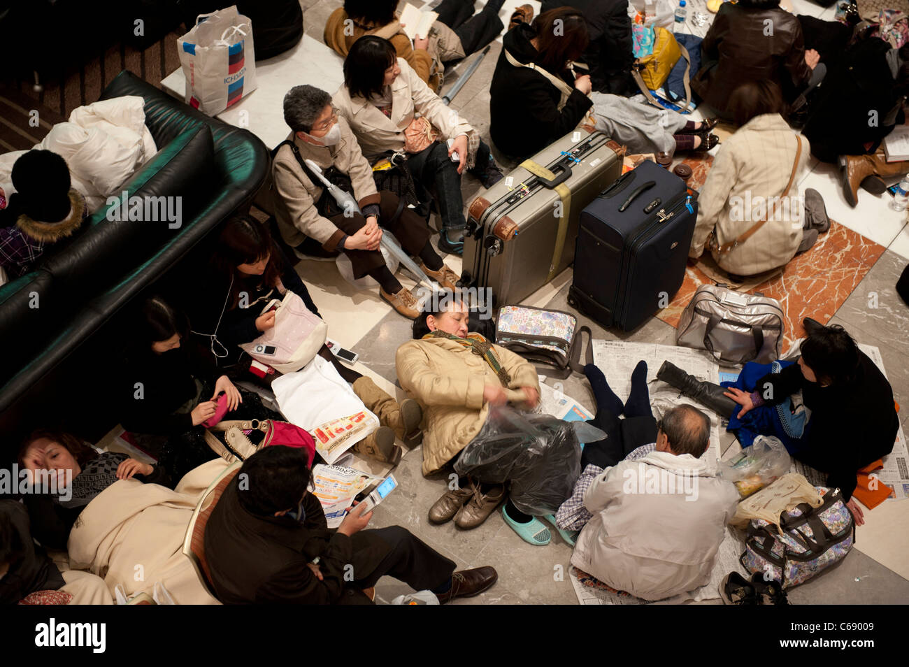 People taking refuge in a the Prince Hotel, Shinagawa,Tokyo, 11 March 2011. following a huge earthquake in north-east Japan Stock Photo