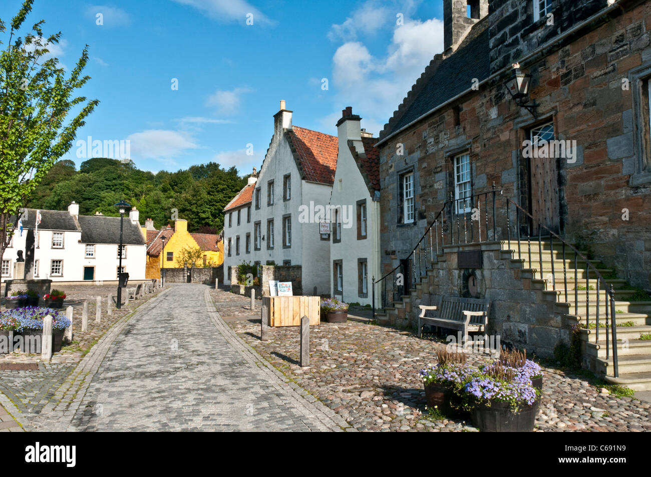 Cobbled Street in Culross Fife Scotland with Town Hall Stock Photo