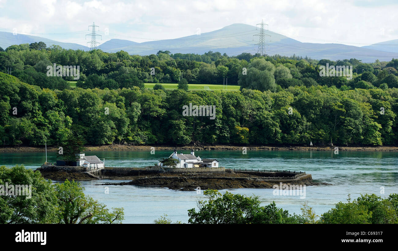 Houses on tiny island in middle of Menai Straits, Anglesey, North Wales
