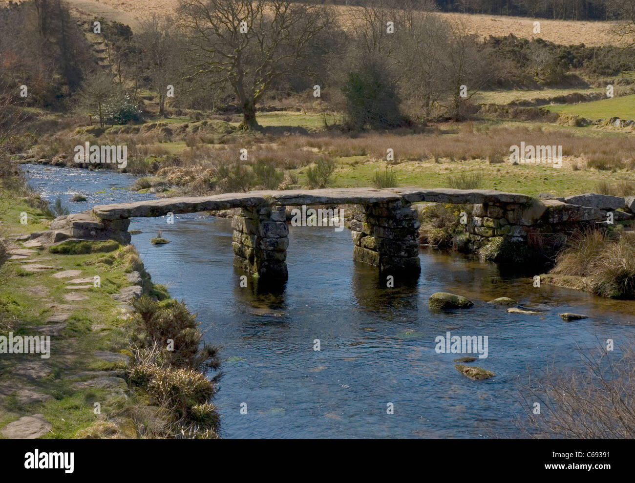 Clapper Bridge at Postbridge over East Dart River, Dartmoor National Park, Devon, England. Stock Photo