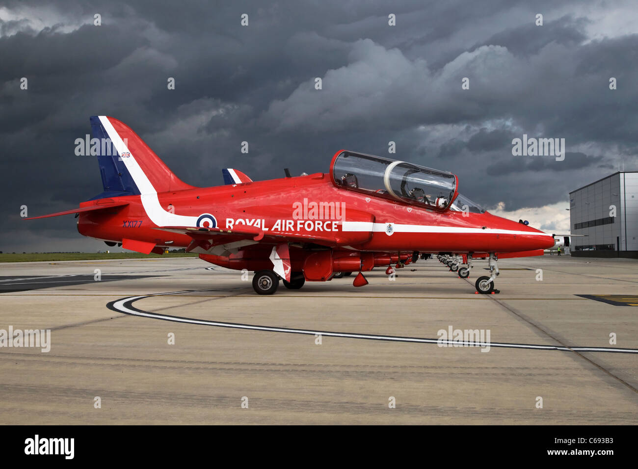 A Bae systems Hawk T1 training aircraft of the RAF's Red Arrows aerobatic team Red One the team leaders aircraft Stock Photo