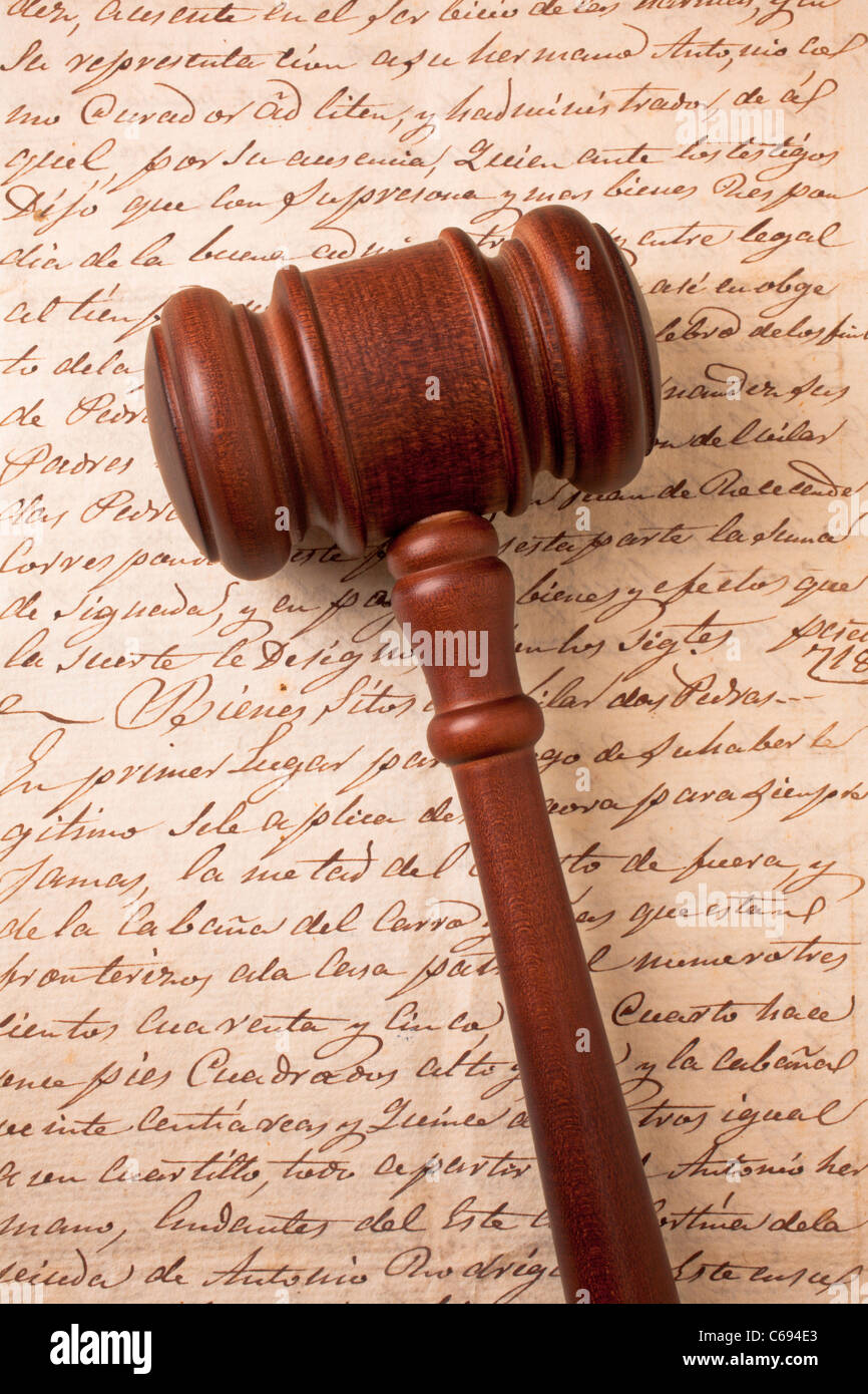 Gavel on old letter Stock Photo