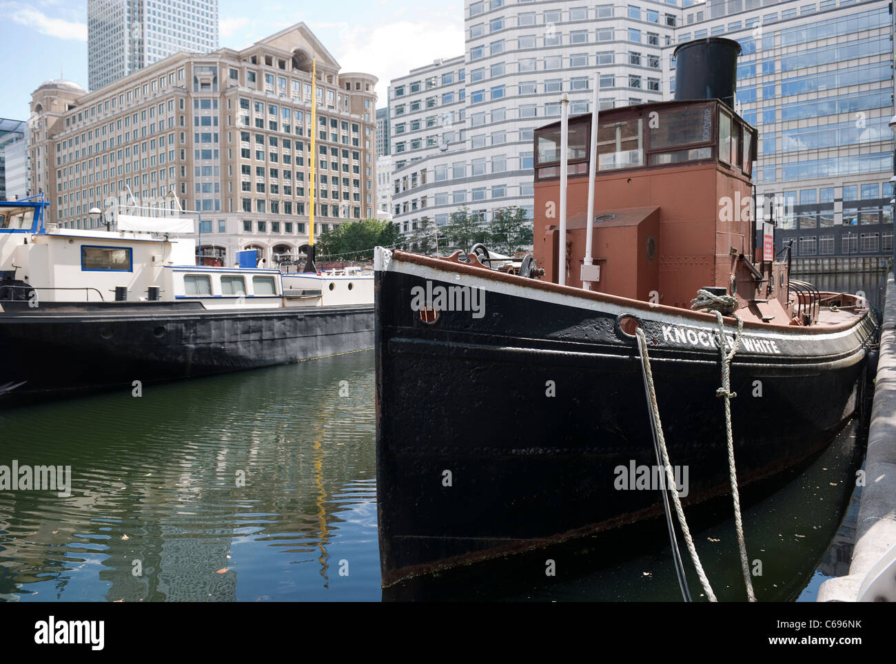 Knocker White Tug Boat Moored in West India Dock, Canary Wharf, London