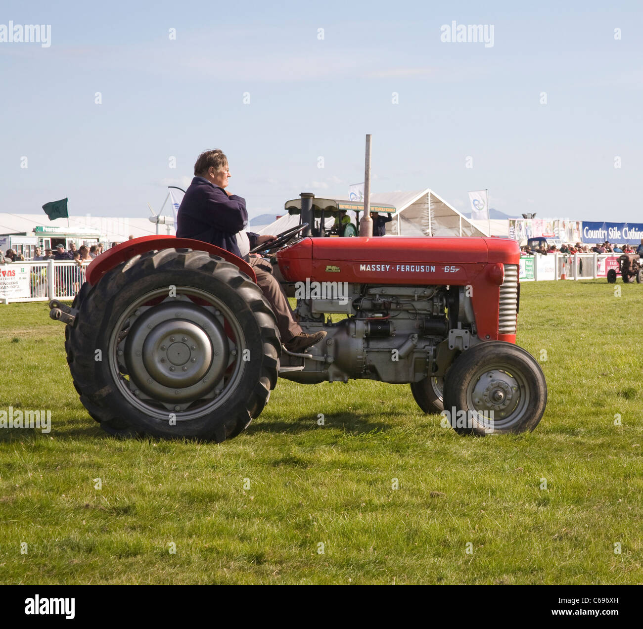 Vintage red Massey Ferguson 65 tractor an exhibit at agricultural show Stock Photo