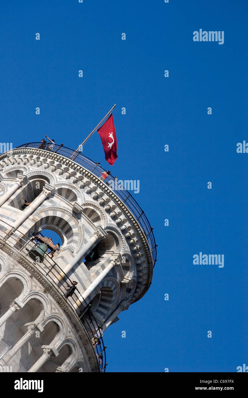 Flag and Bell Tower of the Leaning Tower of Pisa, Italy Stock Photo