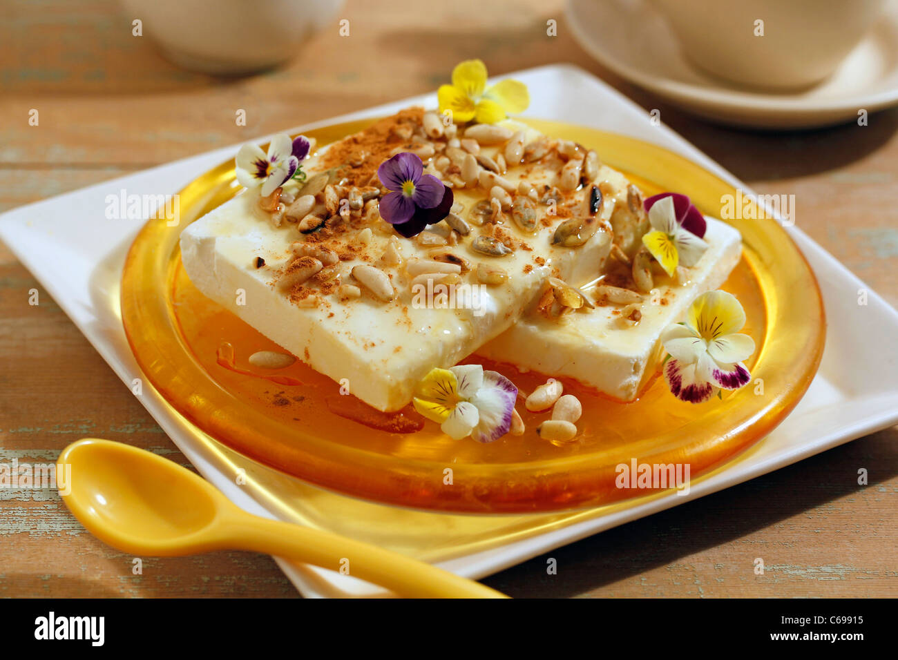 Soft cheese with honey and nuts. Recipe available Stock Photo Alamy
