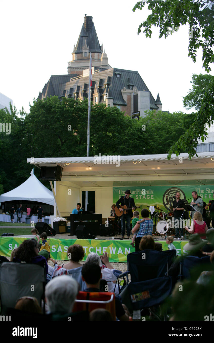 band on stage as part of the Saskatoon Jazz Festival in front of the delta bessborough hotel Saskatchewan Canada Stock Photo