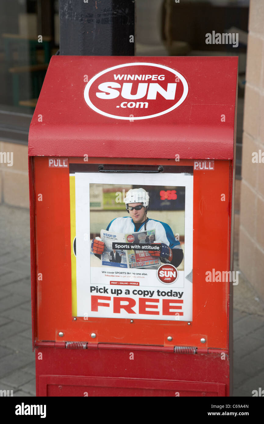 free newspaper dispenser box for the Winnipeg sun Manitoba Canada Stock Photo