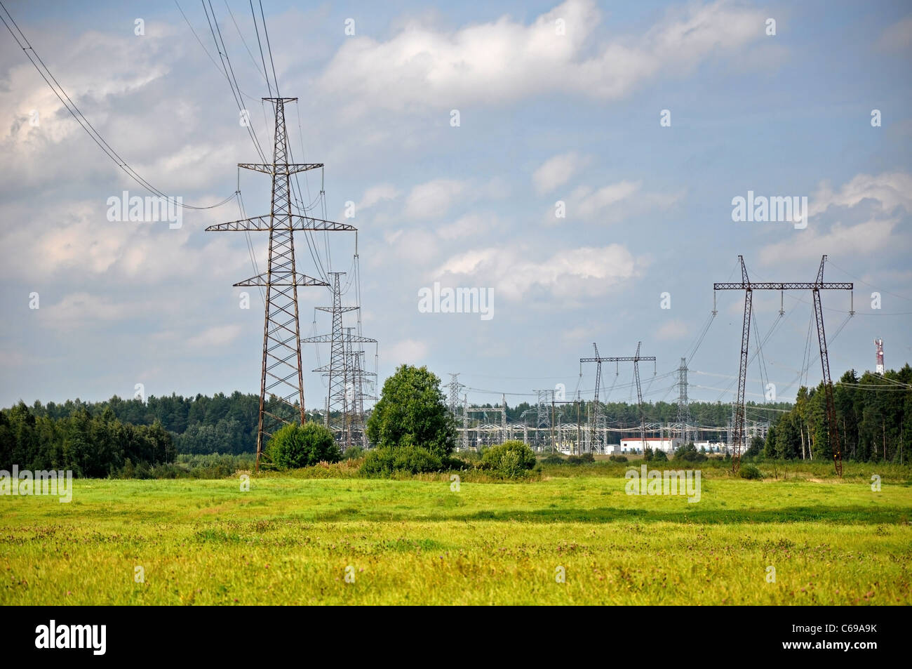 Power lines on a background of the blue sky and clouds Stock Photo - Alamy