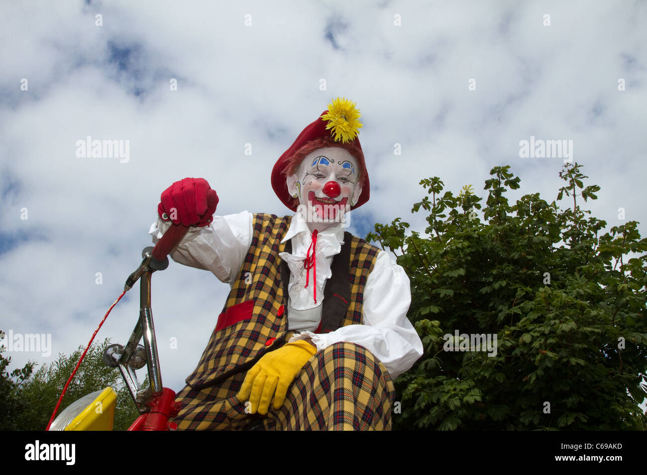 Fun, Comic, Entertainers. Red nose Professional clowns 'Sunny & Rainbow wearing checkered suit. Clowning Around at the 28th Southport Flower Show Showground Victoria Park, 2011 Stock Photo