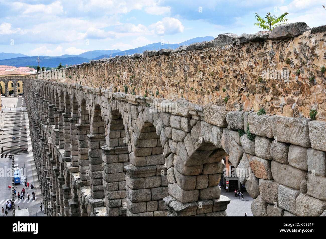 Perspective View of Ancient Roman Aqueduct in Segovia, Spain Stock Photo