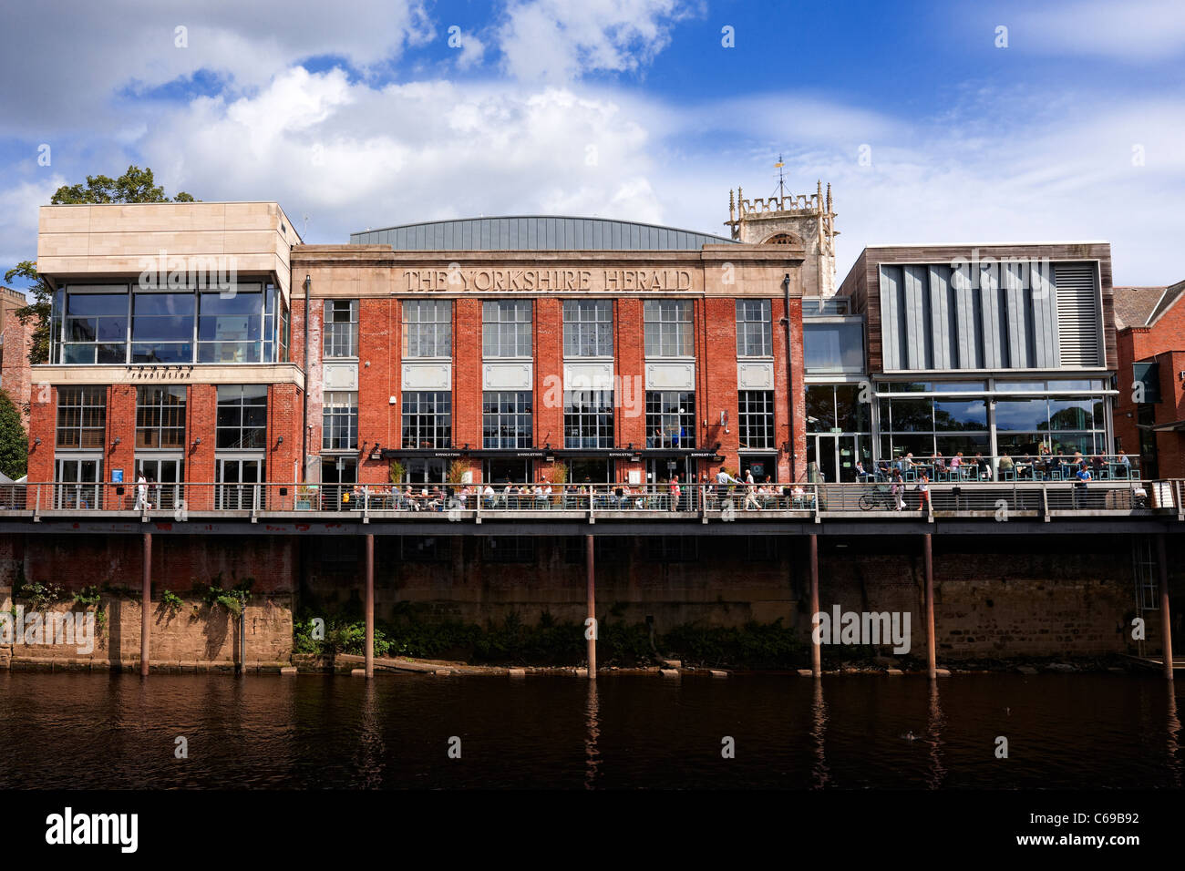 York city centre, former Yorkshire Herald building now used as a cinema, waterfront restaurant and bar Stock Photo