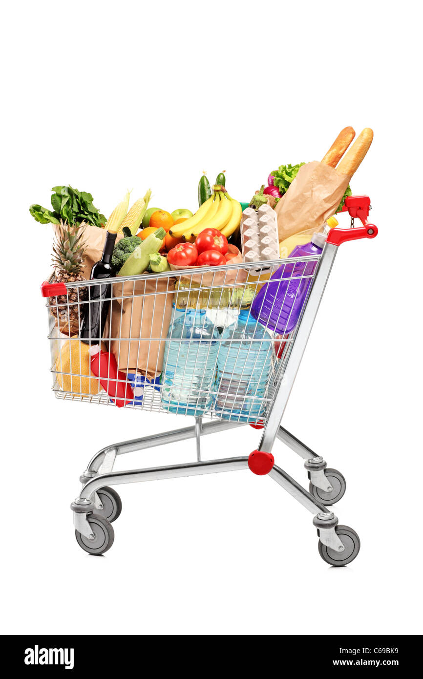 A shopping cart full with groceries Stock Photo Alamy