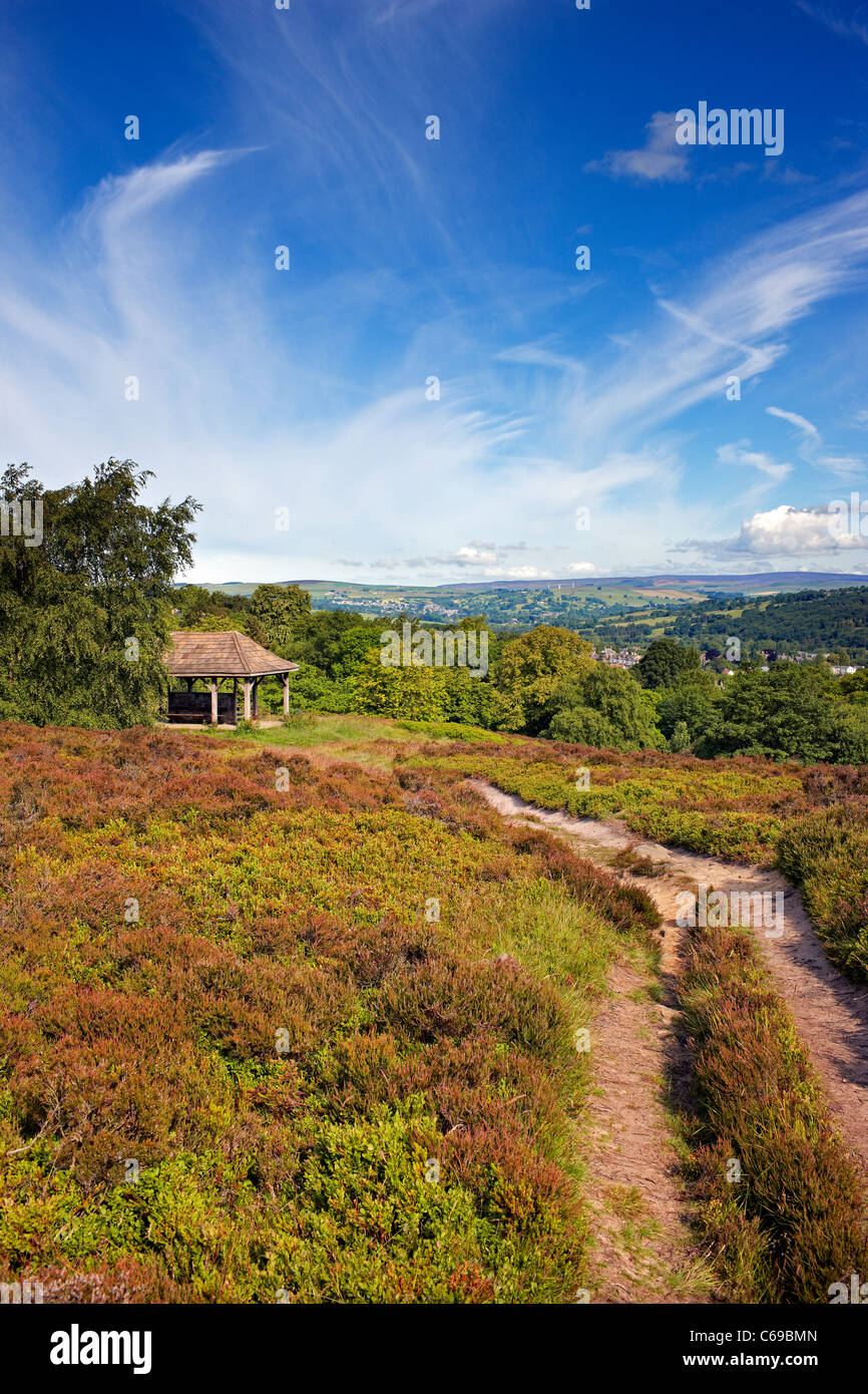 Ilkley moor, a seat shelter to enjoy the view above the town Stock Photo