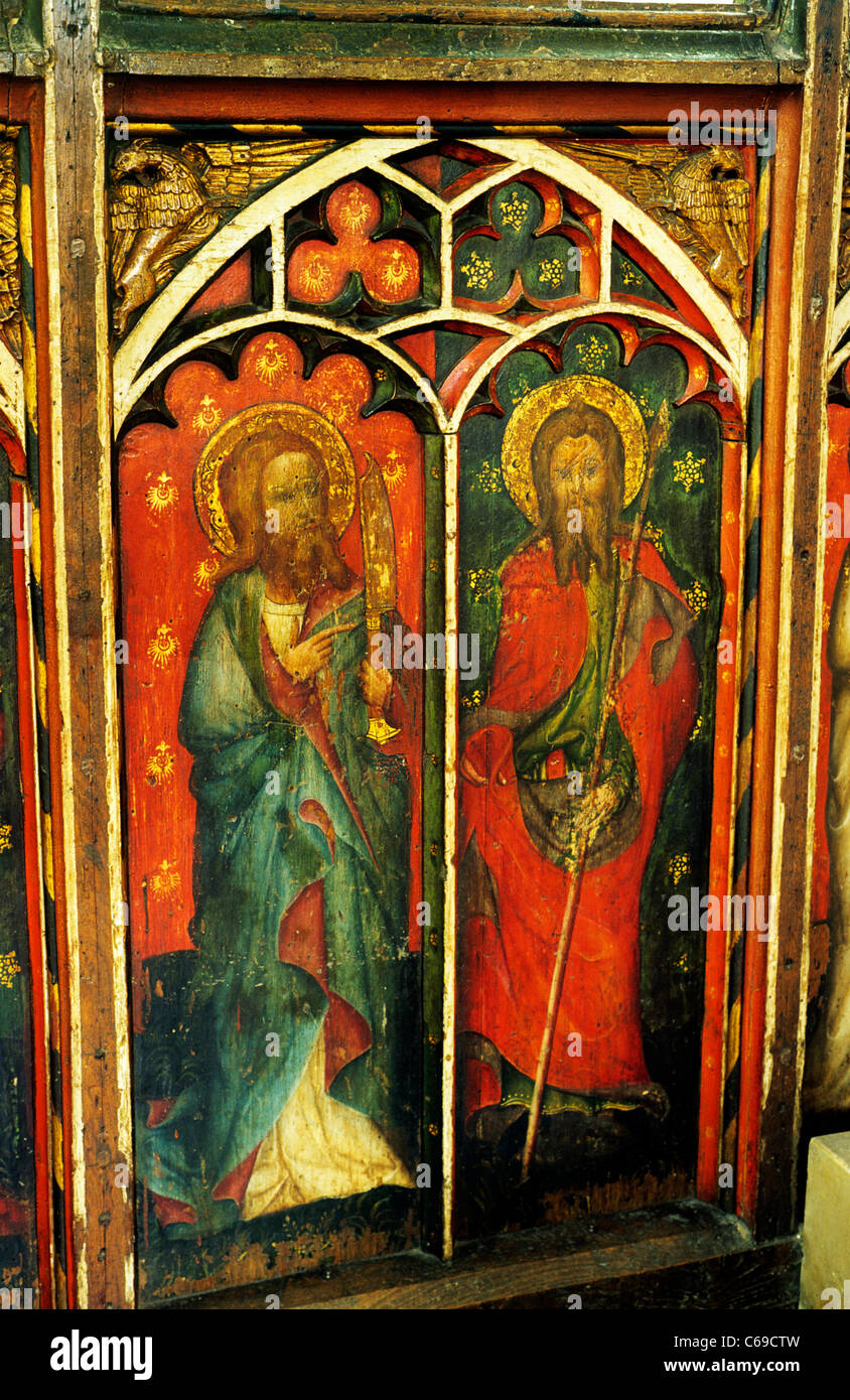 Castle Acre, Norfolk. Rood screen, St. Bartholomew, St. Thomas. Bartholomew holds Flaying Knife, Thomas holds a Spear England UK Stock Photo