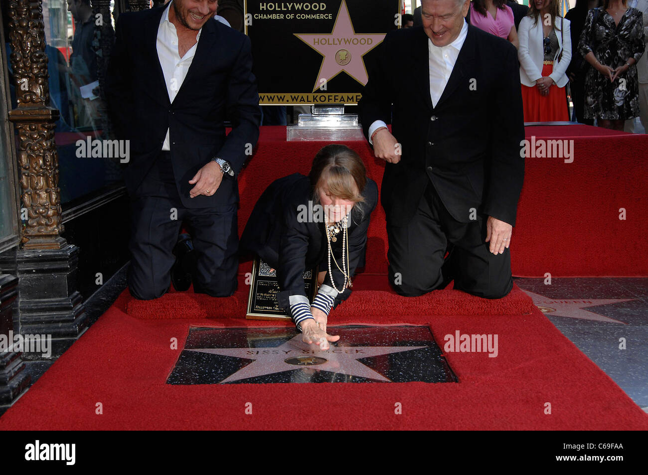 Bill Paxton, Sissy Spacek, David Lynch at the induction ceremony for Star on the Hollywood Walk of Fame Ceremony for Sissy Spacek, Hollywood Boulevard, Los Angeles, CA August 1, 2011. Photo By: Michael Germana/Everett Collection Stock Photo