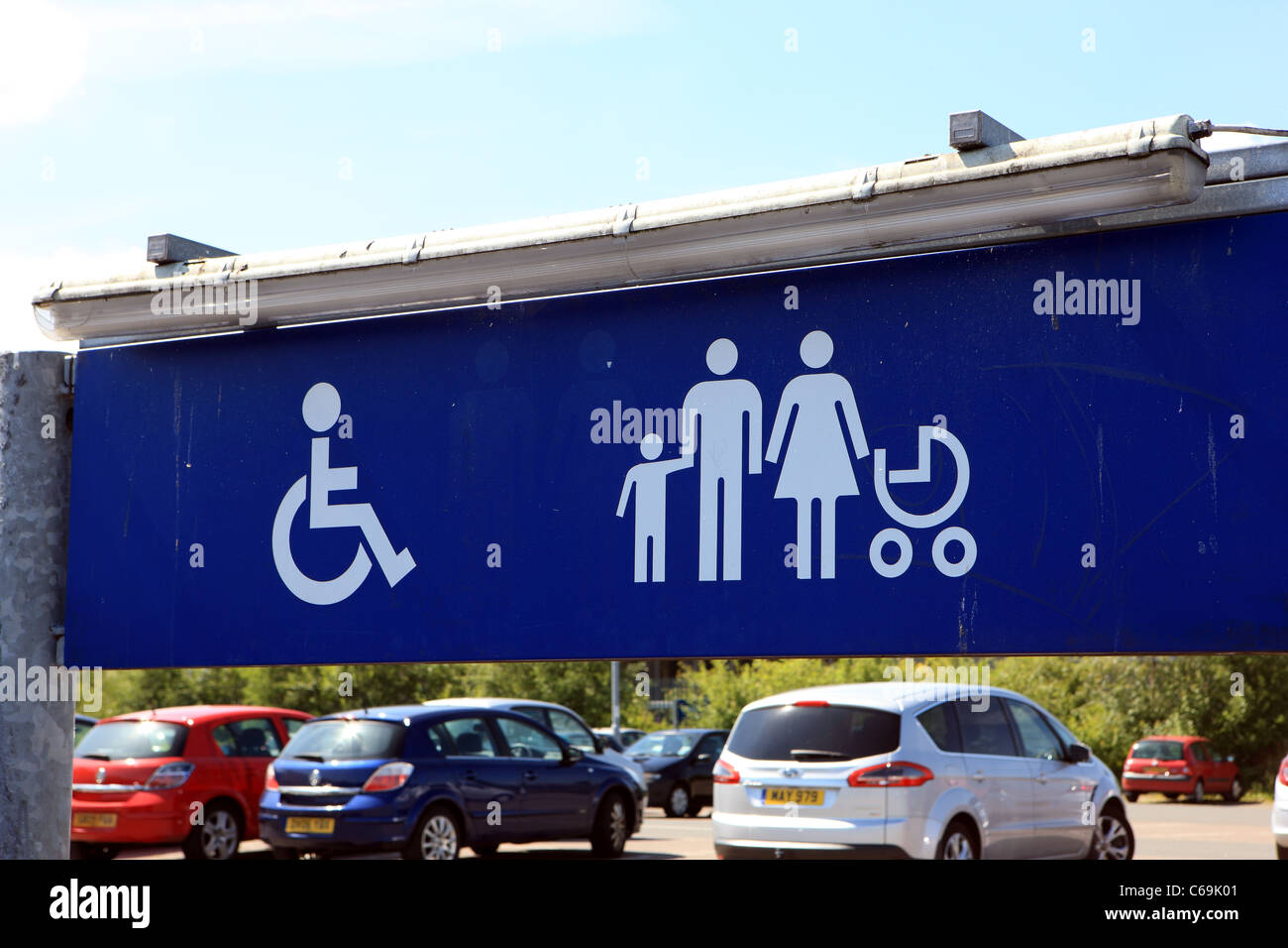 Parking sign for disabled and family parking spaces Stock Photo