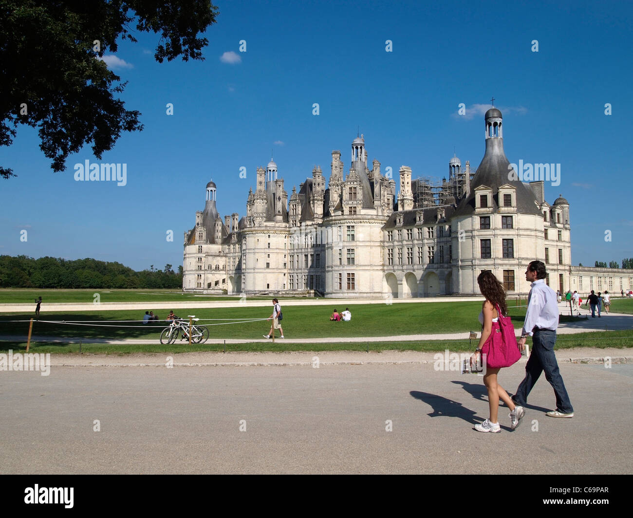 Couple visiting the largest of the Loire valley castles, Chateau Royal de Chambord, France Stock Photo