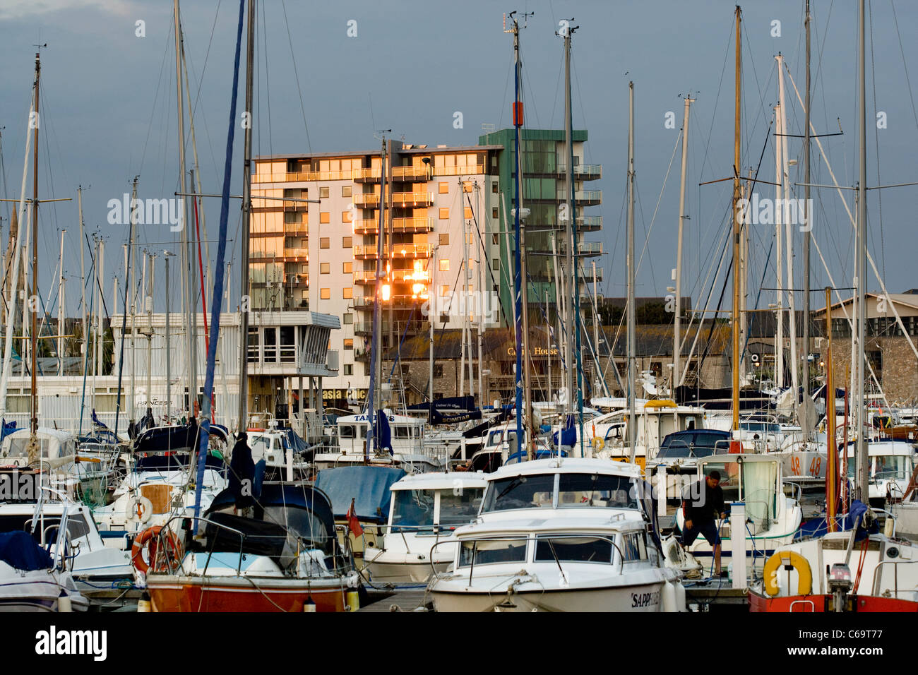 Leisure boats and high rise residential apartments at Sutton Harbour