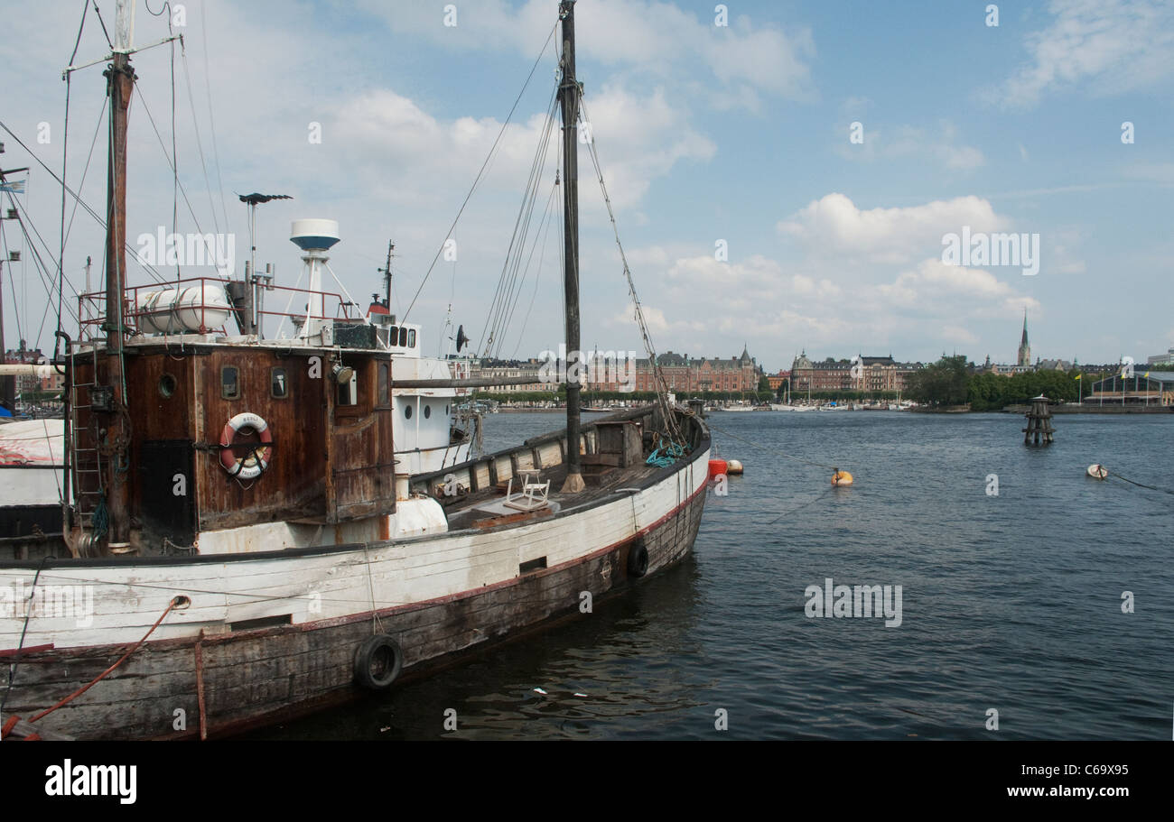 Old fishing boat in Stockholm harbour Stock Photo