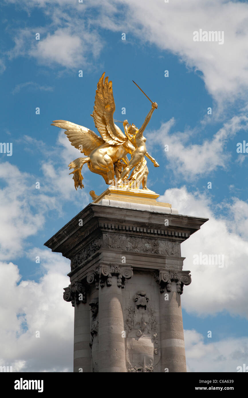 Paris - statue in gold from Alexandre III bridge Stock Photo