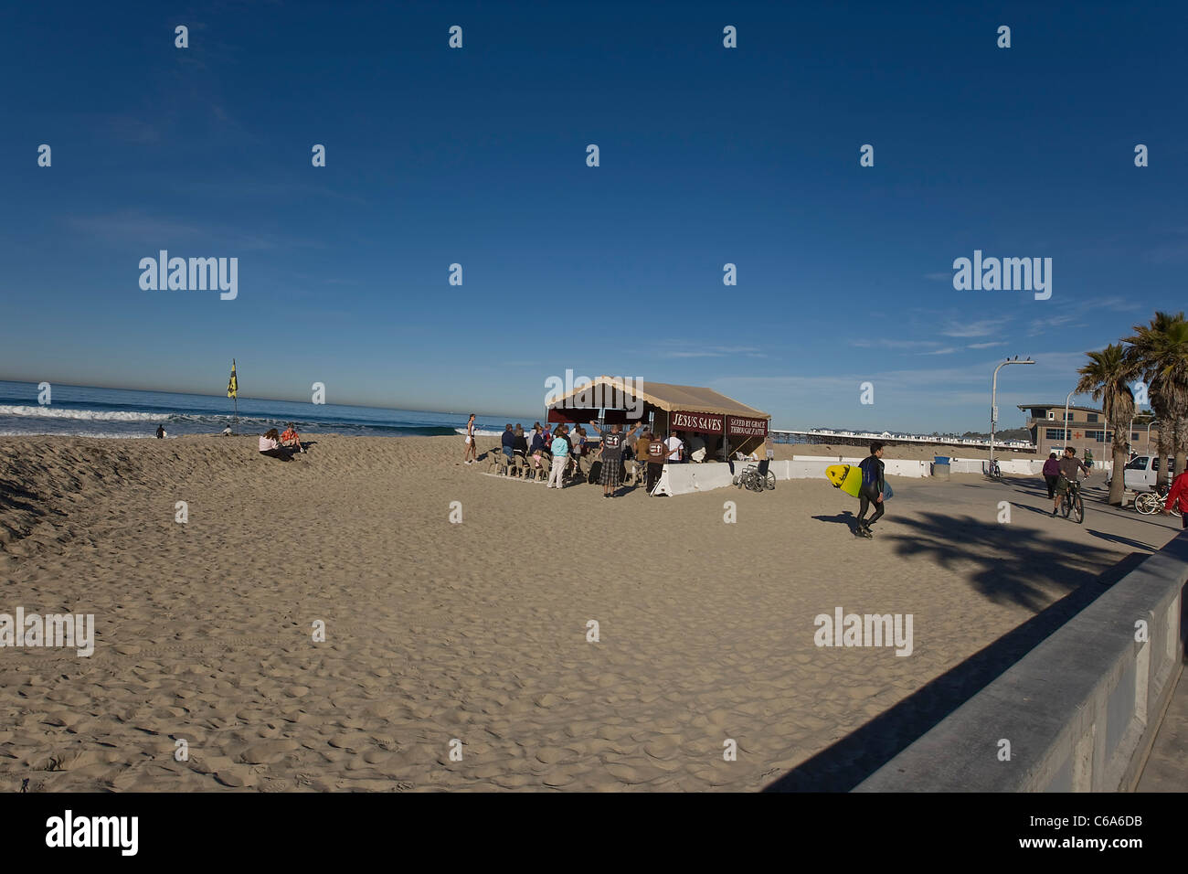 Morning prayers on the beach in california Stock Photo