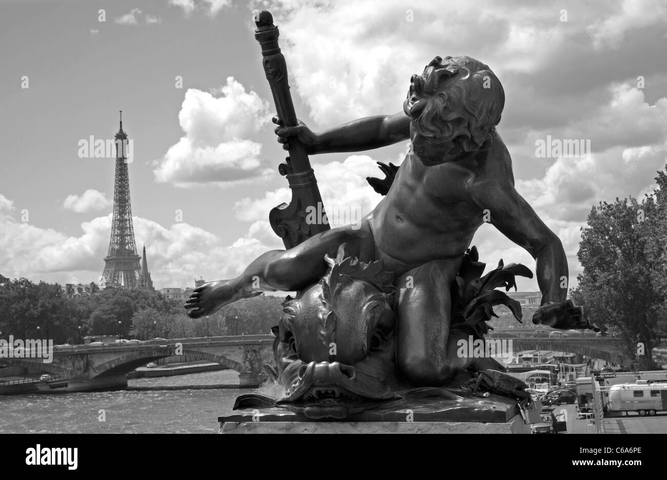 Paris - statue from Alexandre III bridge and Eiffel tower Stock Photo