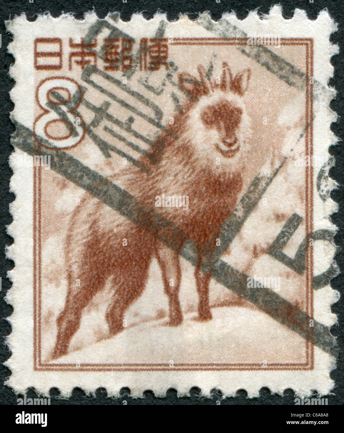 JAPAN - 1952: A stamp printed in Japan, depicts Japanese serow (Capricornis crispus) Stock Photo