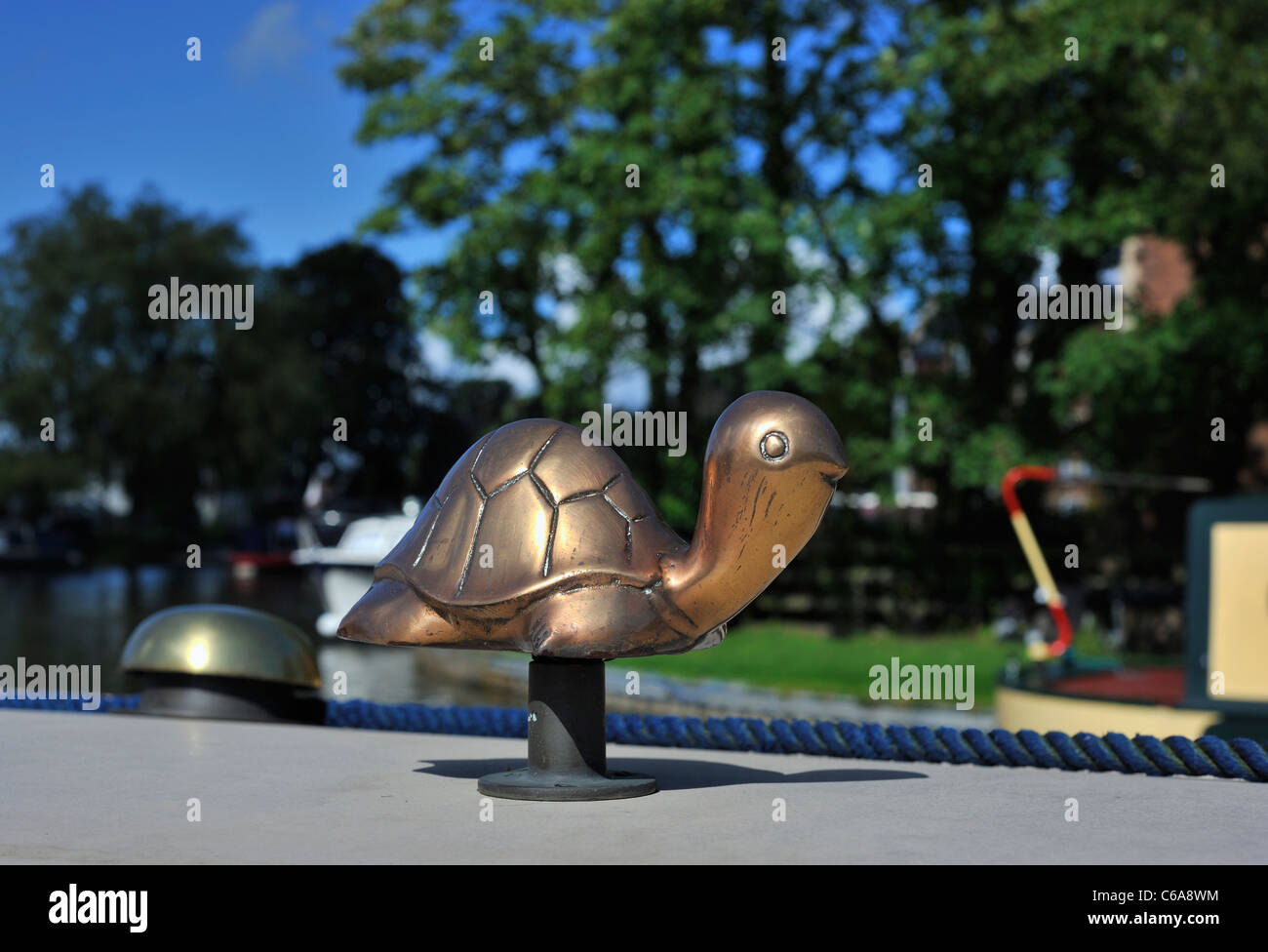 Small Brass Ornamental Turtle On Top Of Canal Longboat