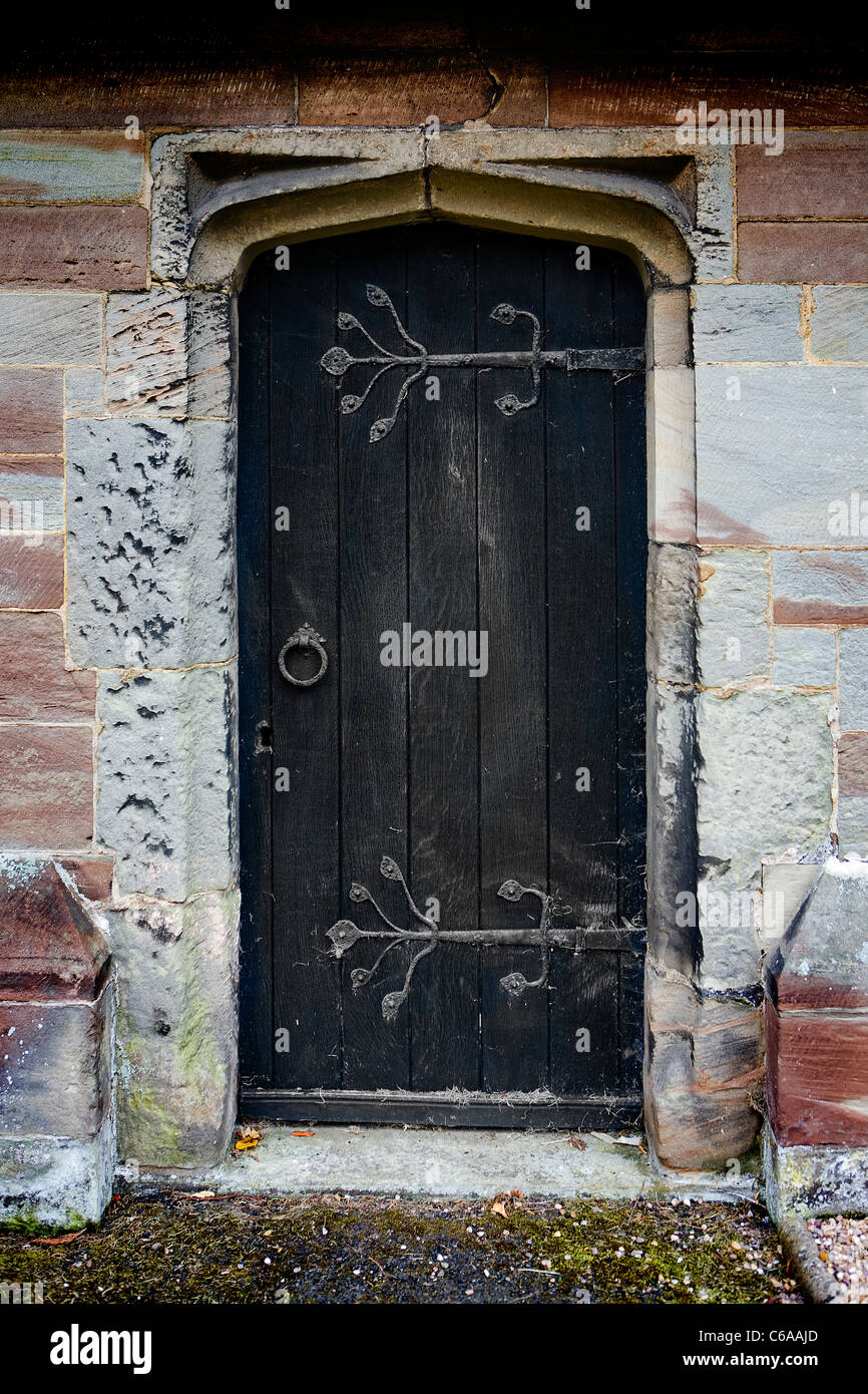 Ornate Georgian hinge on the vestry door of St James' Church in Acton Trussell, Stafford Stock Photo