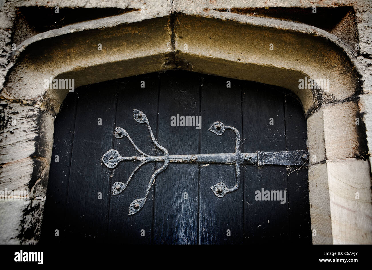 Ornate Georgian hinge on the vestry door of St James' Church in Acton Trussell, Stafford Stock Photo