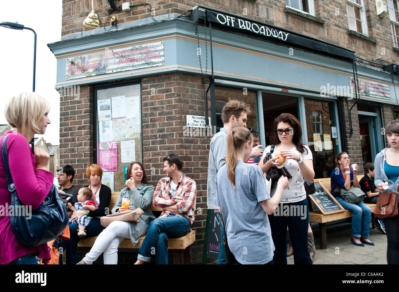 People in Cafe, Broadway Market, Hackney, London, UK Stock Photo