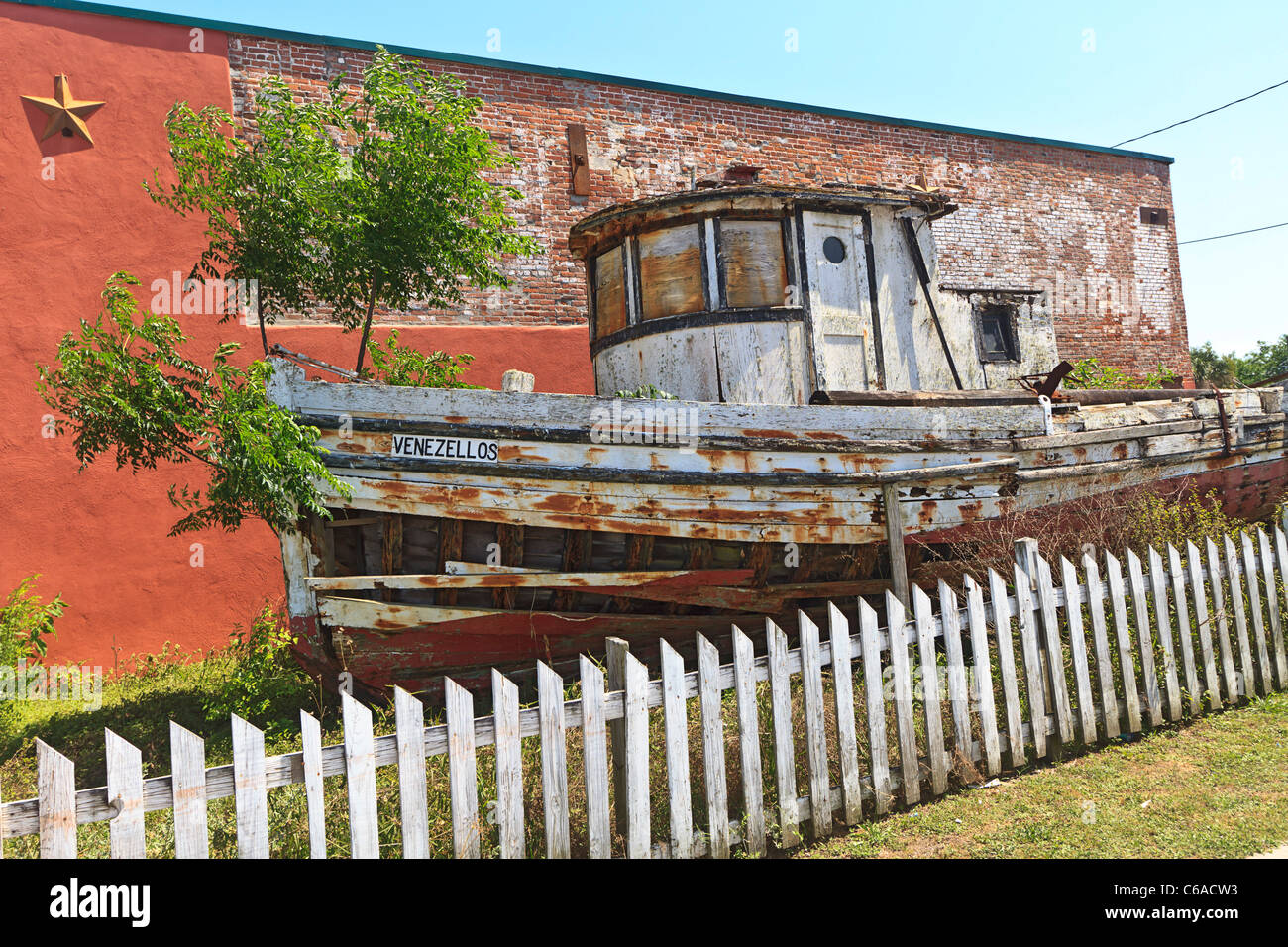 Old Greek fishing trawler boat on display on a street in Apalachicola, Florida Stock Photo