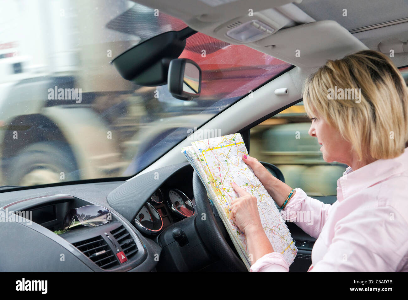 woman reading map while driving car Stock Photo 38338591 Alamy