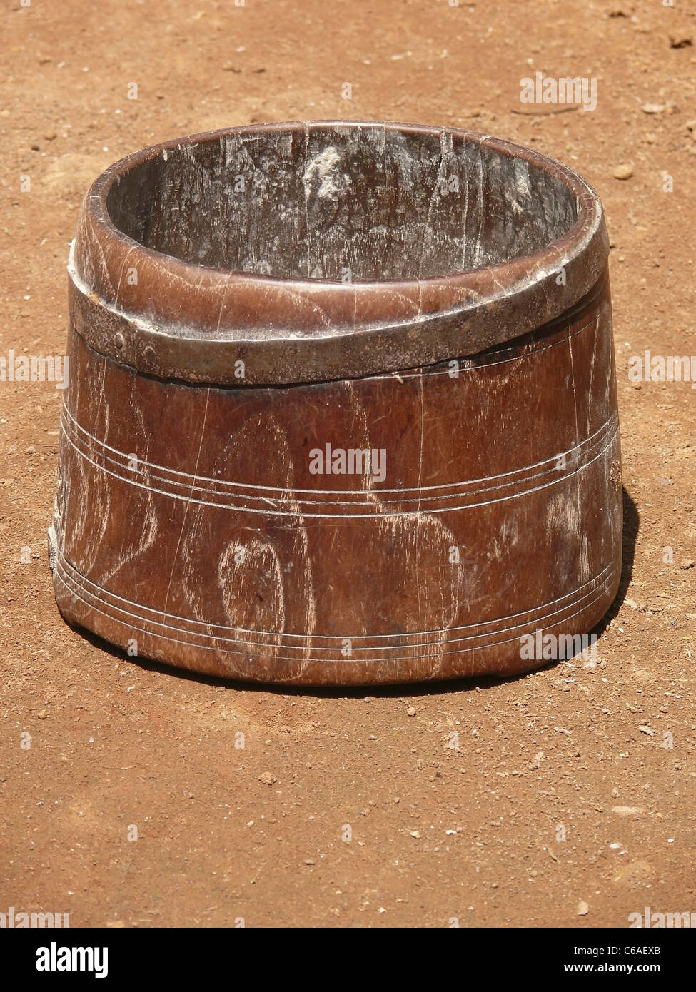 Traditional wooden grain measuring pot called Payali in marathi