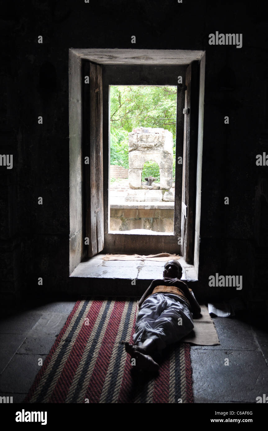 old man sleeping near the open door Stock Photo Alamy