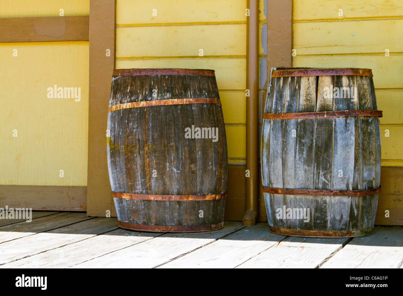 Old oak barrels on railroad platform. Stock Photo