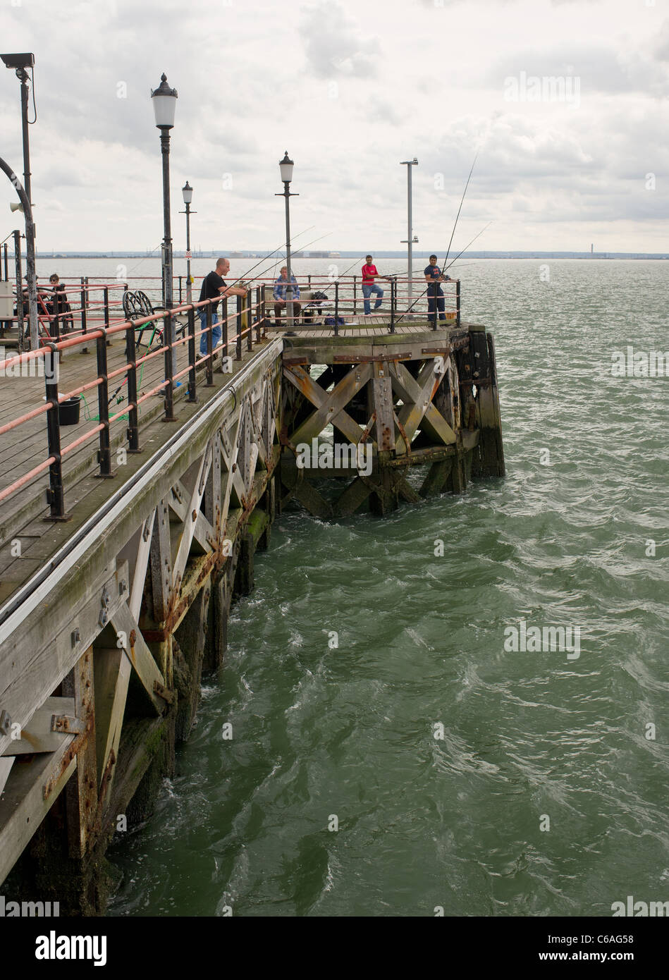 Anglers fishing on Southend Pier in Essex Stock Photo