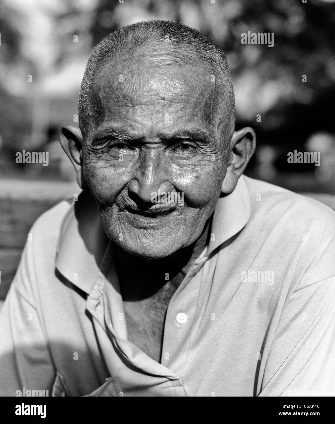 Black and white photography portrait of an elderly asian man thailand southeast asia stock