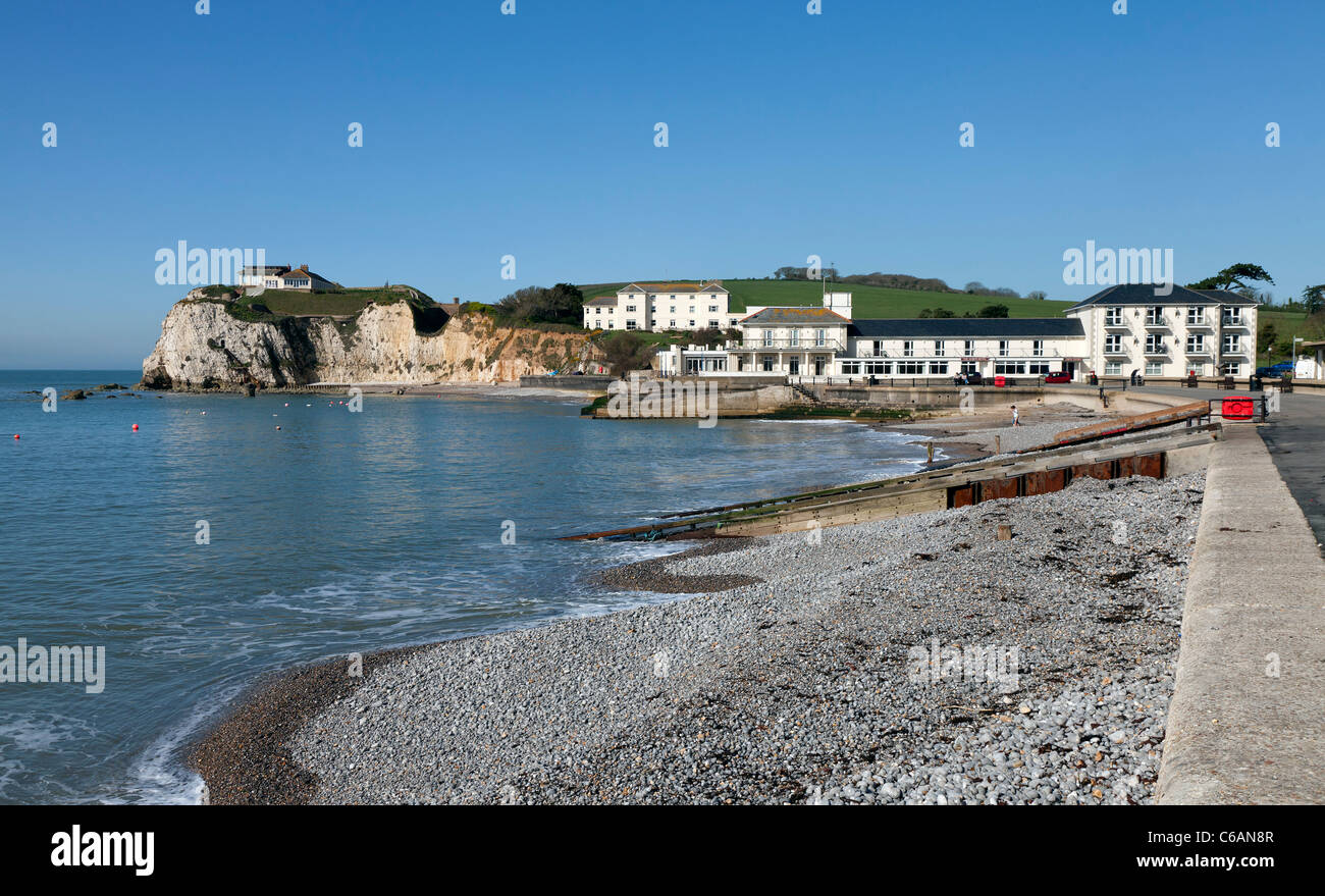 Freshwater Bay IOW Isle of Wight Albion Hotel low tide empty stone pebble beach spring quiet Stock Photo