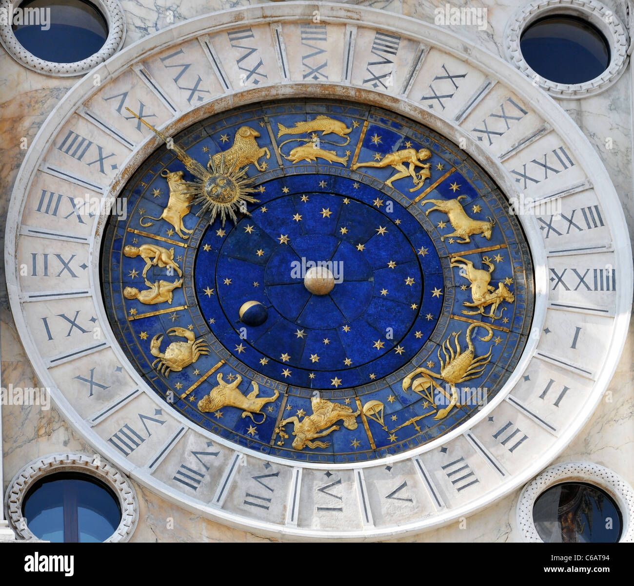 Old astronomical clock with zodiac signs and moon phase Stock Photo