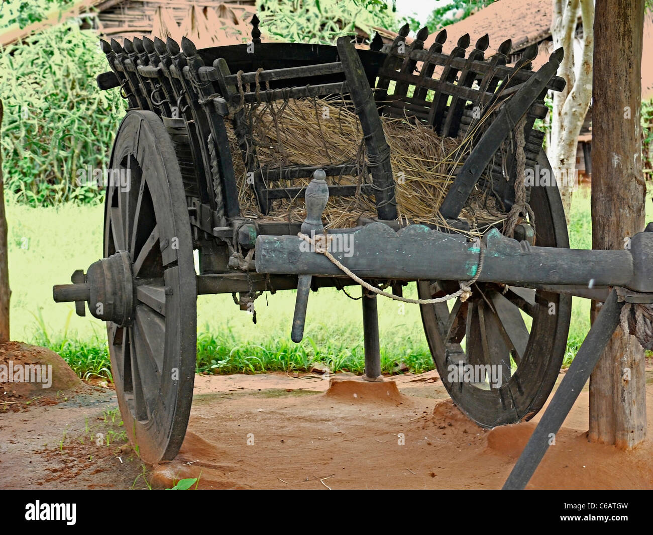 An old wooden bullock cart is displayed in a museum, Madhya pradesh