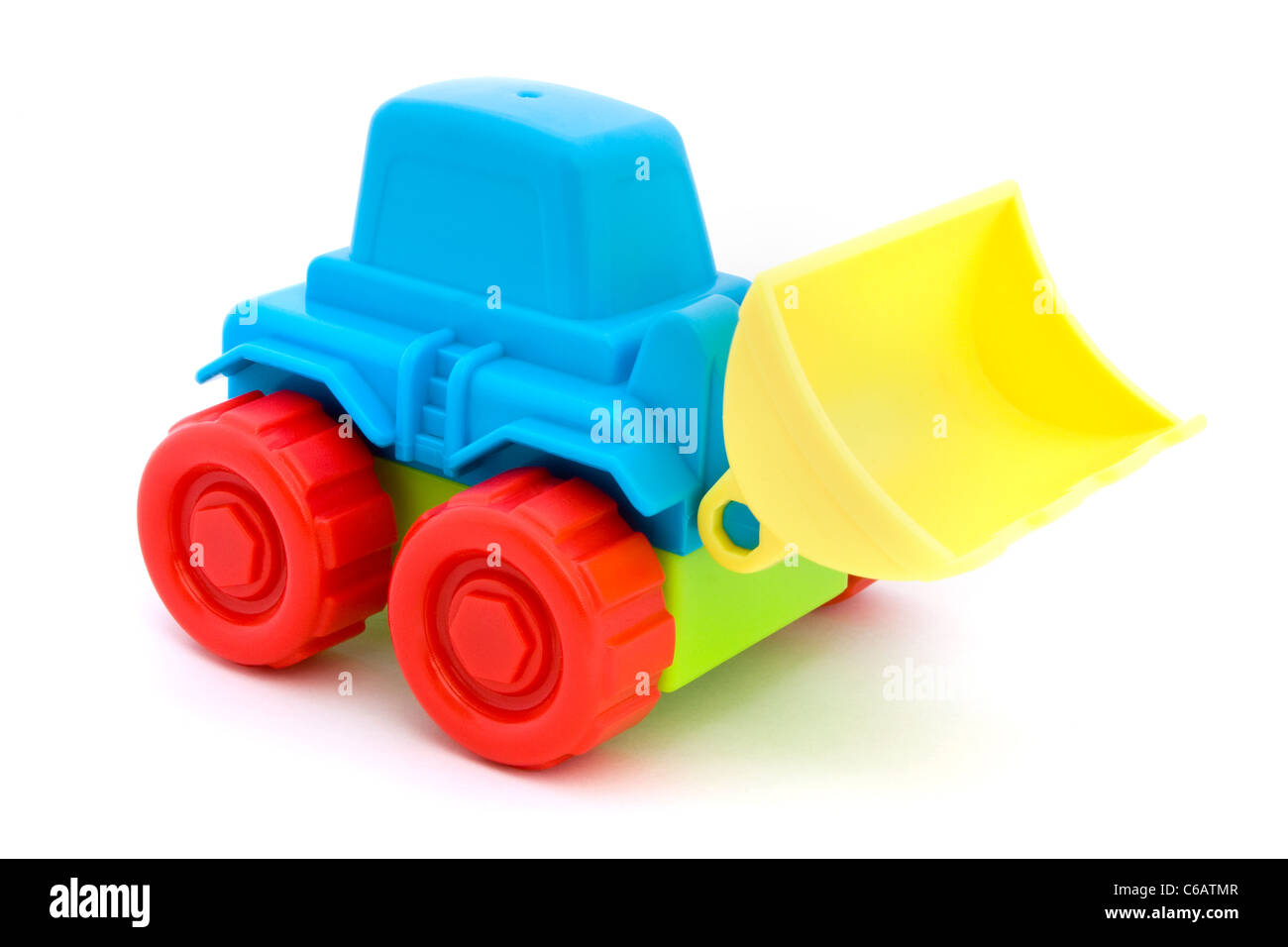 Colorful toy tractor isolated on a white Stock Photo