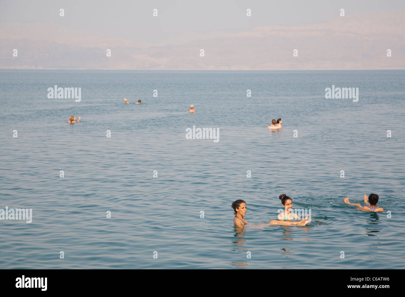 People swimming in Dead Sea, Israel Stock Photo