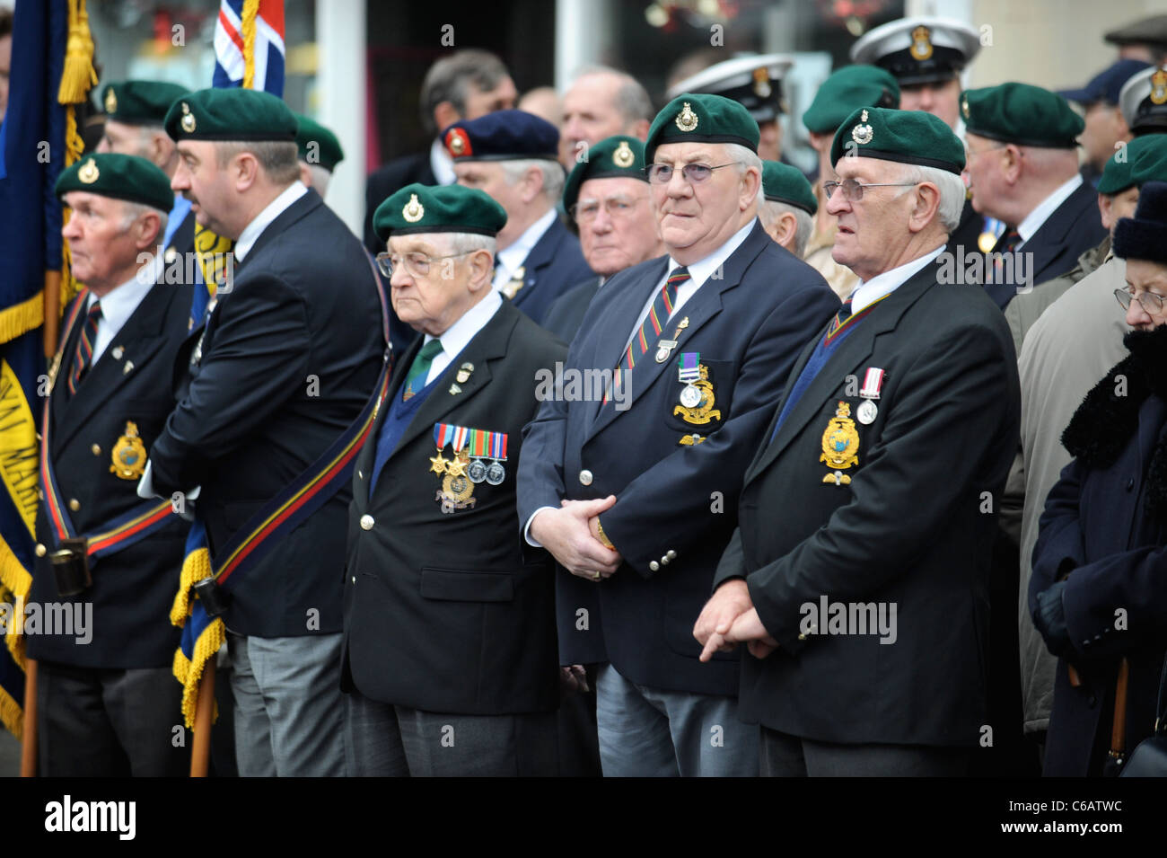 Royal Marines veterans amongst mourners gathered for a repatriation ceremony at Wootton Bassett, Wiltshire UK Dec 2008 Stock Photo