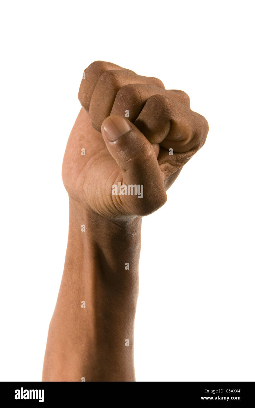 African's clenched fist in black power salute. Studio shot on white background. Stock Photo